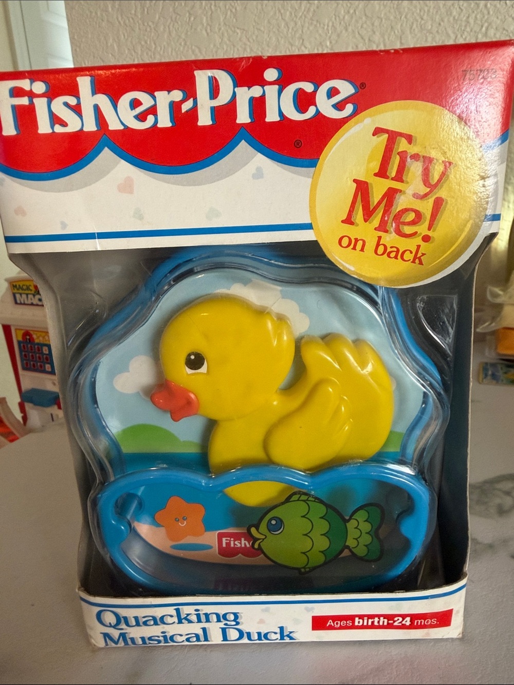 NIB 1995 vintage Fisher-Price Yellow & Blue Quacking Musical Duck Toy